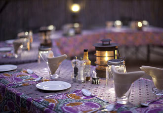 Exquisite dining under the stars at Sausage Tree Safari Camp