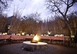 Traditional boma dining under the stars at Sausage Tree Safari Camp