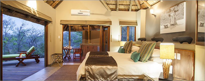 Luxury suites at Tambuti Lodge - king-size beds, bath amenities, gowns and slippers